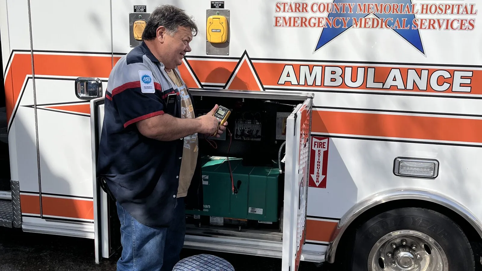 Rey Cavazos servicing a Starr County Memorial Hospital ambulance at Rio Auto Electric