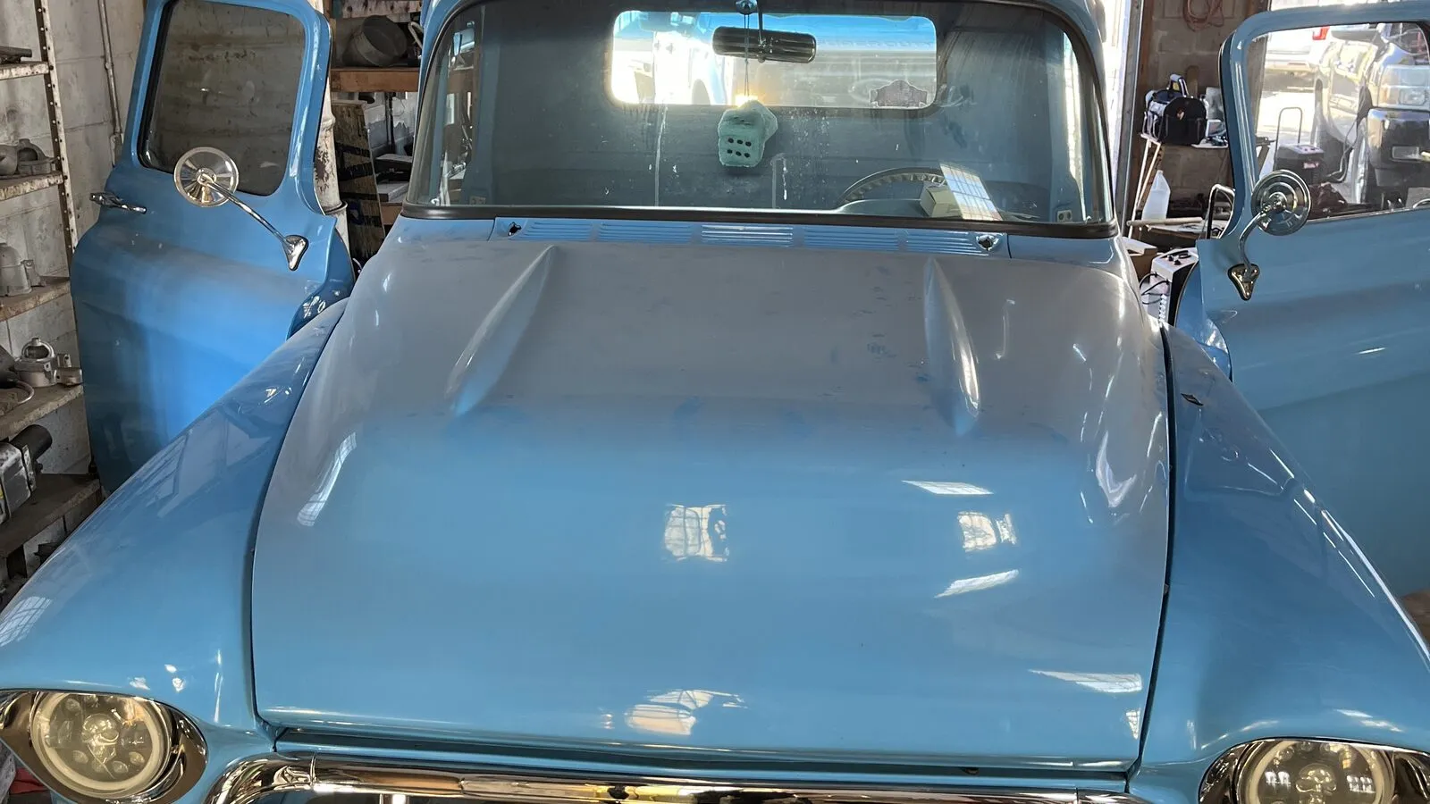 Restored 1950s Chevrolet pickup in the bay at Rio Auto Electric during a wiring project