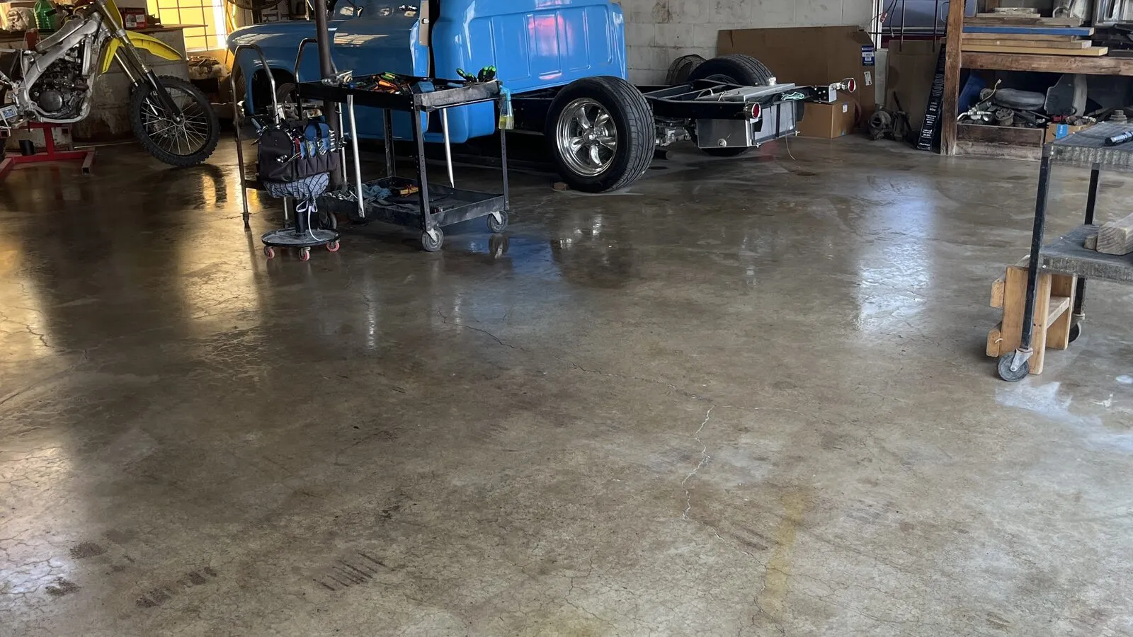 Inside the Rio Auto Electric service bays with vehicles in for repair